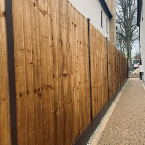 Feather edge panels with brown durapost