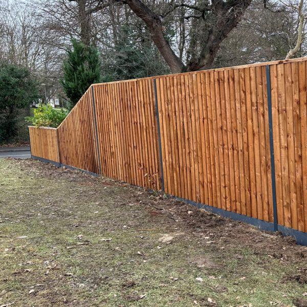 Traditional closeboard fencing with DuraPost