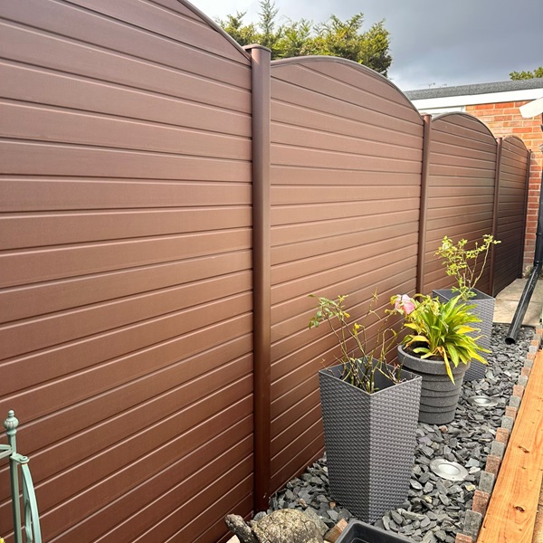 Walnut composite fencing with convex top