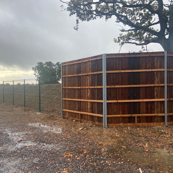 Traditional closeboard and V mesh fencing