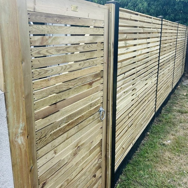 Contemporary with Black Durapost and Prima boards single slatted gate