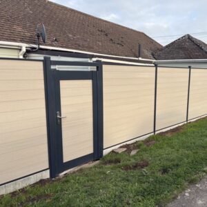 Oyster Vista with A.Grey posts and infill rails with concrete gravel boards