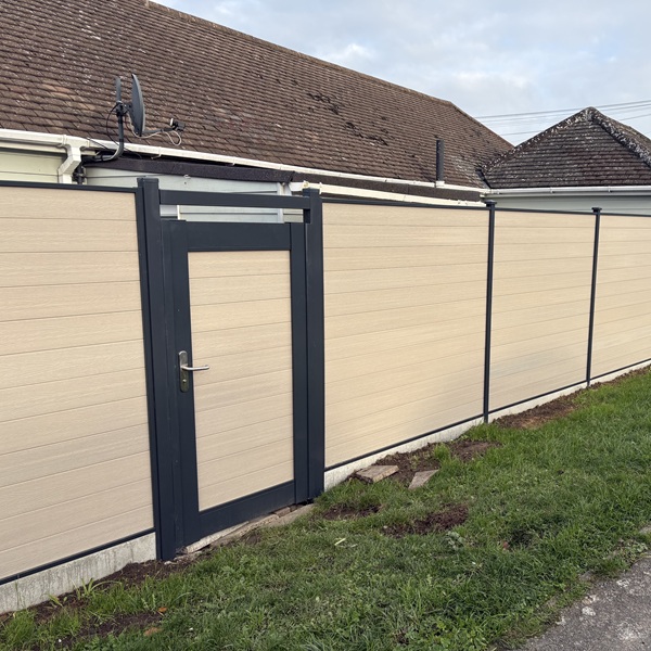 Oyster Vista with A.Grey posts and infill rails with concrete gravel boards