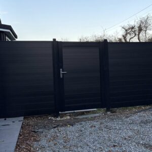 Sleek Privacy fencing and gate with Black DuraPost