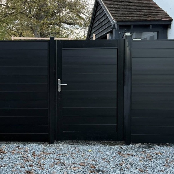 Sleek Privacy fencing and gate with Black DuraPost