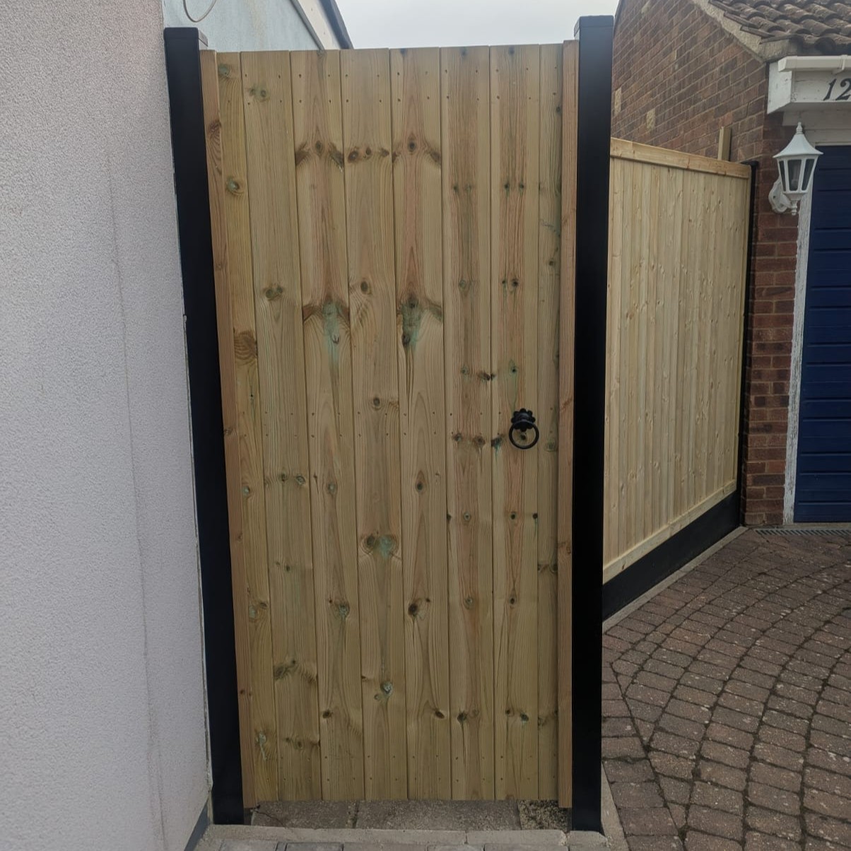 Adjustable steel gate frame with Black DuraPosts