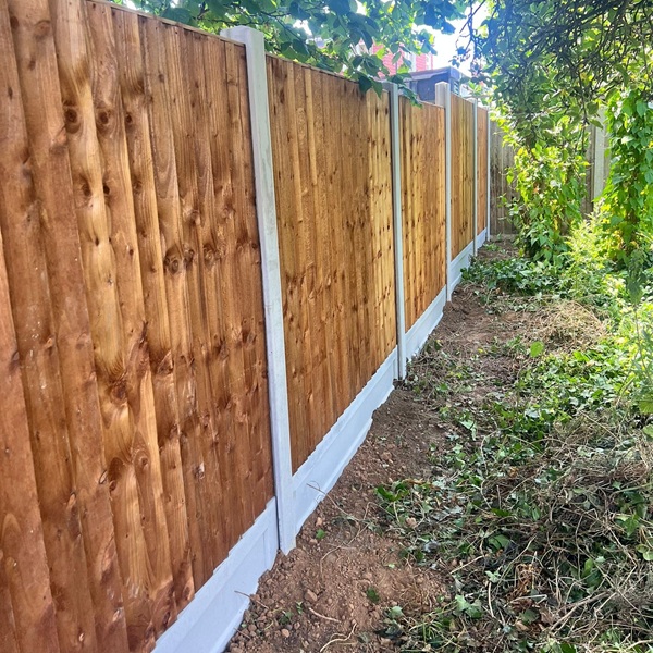 Trade Feather Edge Panels with concrete posts and gravel boards